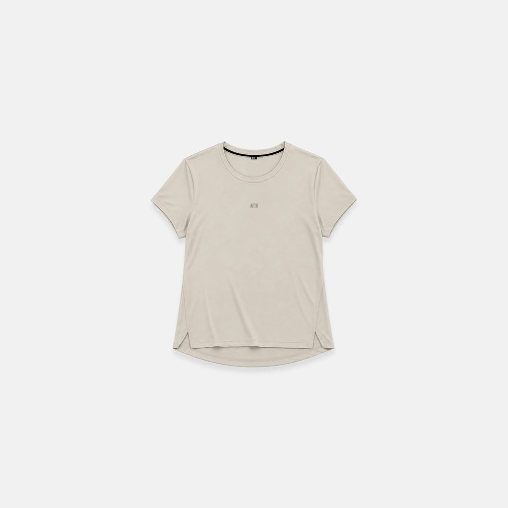 AFTR Motion T, a beige women's t-shirt with a curved hem and small chest logo, front view